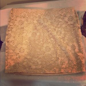 Nude lace mini skirt